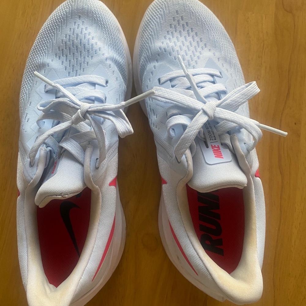 Nike gym shoes! Super comfy, gently worn. Baby blue with color pop.